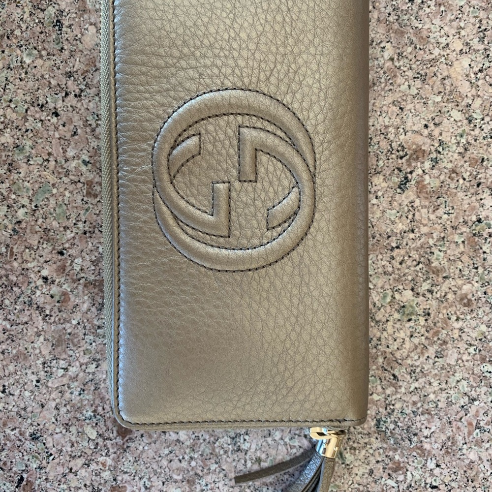 Gucci gold wallet